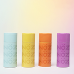 Load image into Gallery viewer, Four colors of noz sunscreen next to each other 

